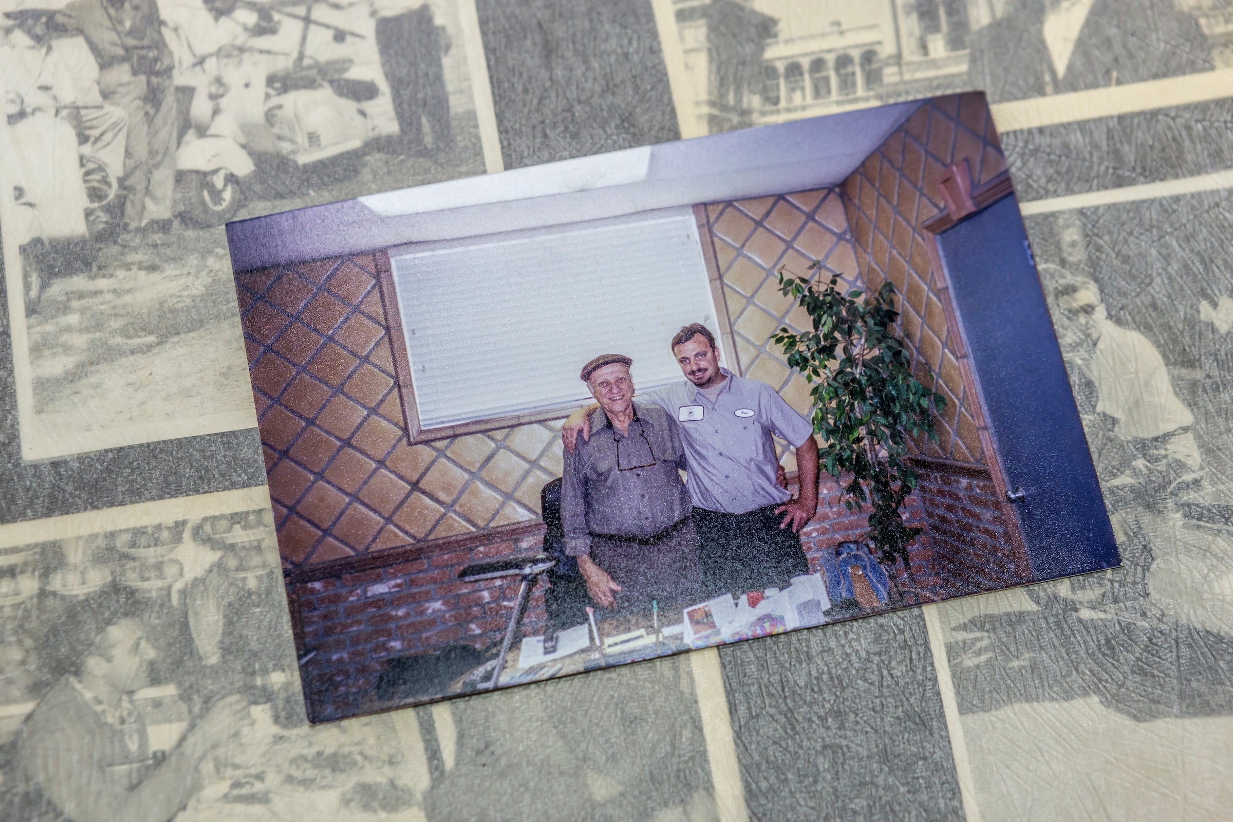 Vod Alajian with his father, Arto, standing arm in arm in the ARTO office