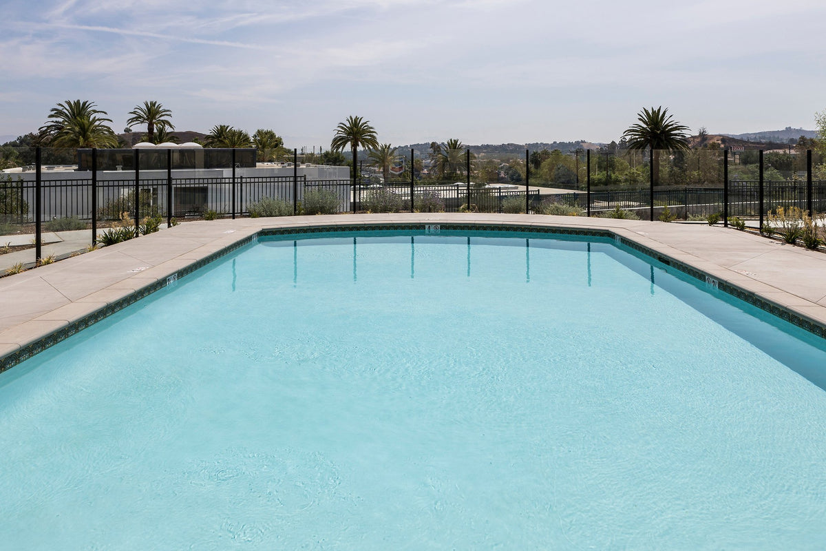 Pool with hillside view