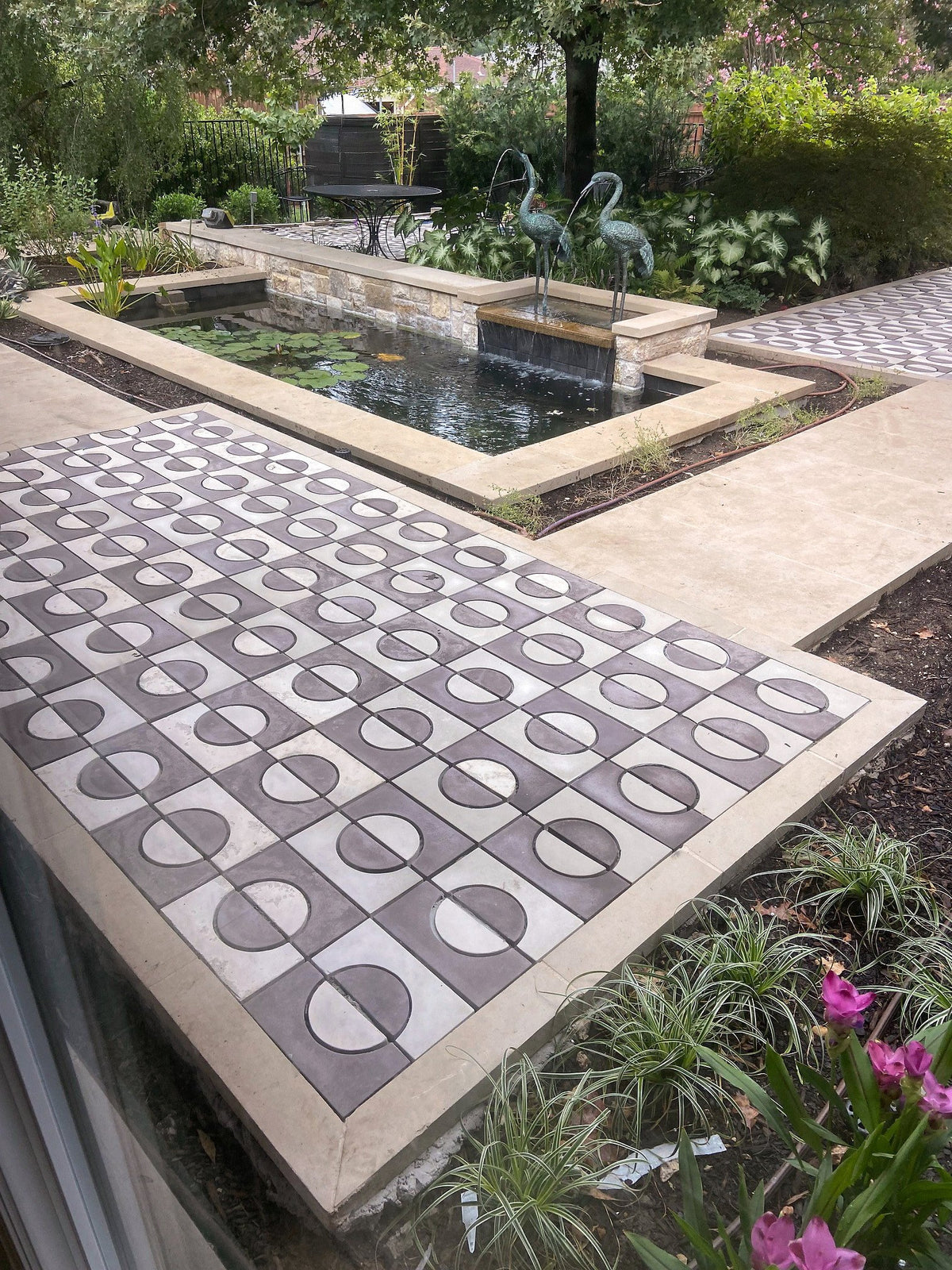 Tiled path along the lily pond