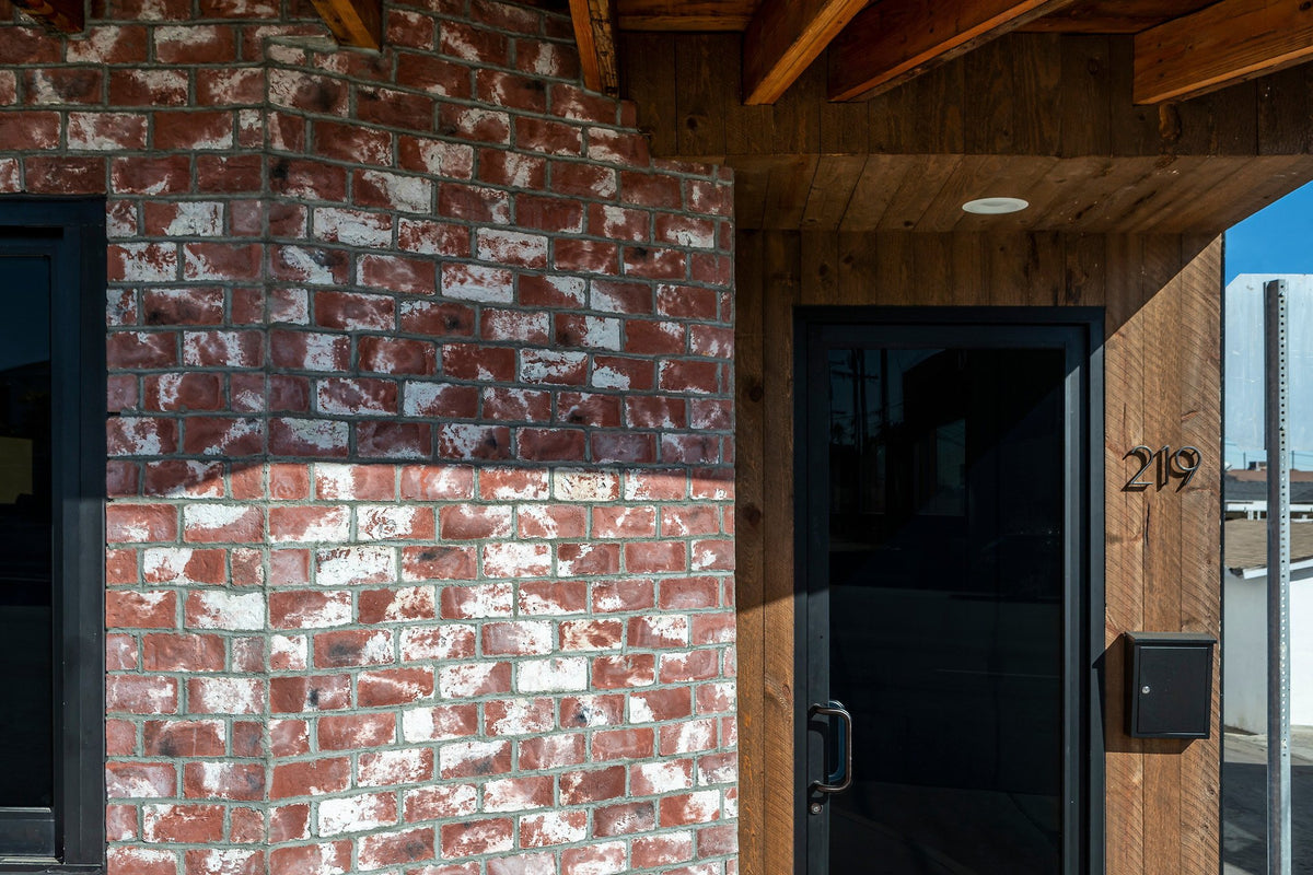 Brick wall at the front entry