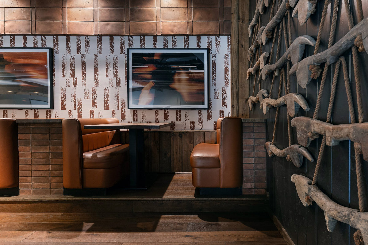 Booth wall in Cotto Gold tile
