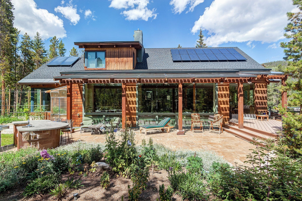 Cabin patio under the timber pergola
