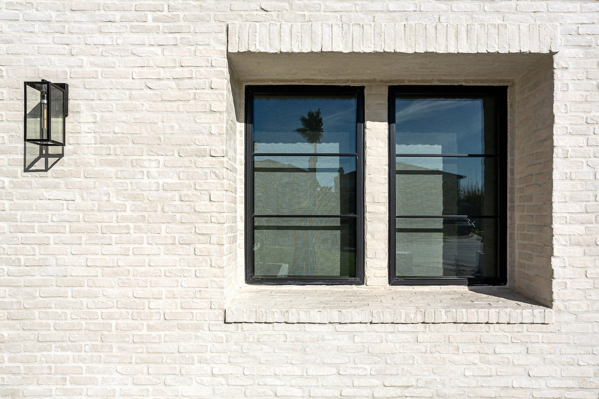 Window set in brick wall