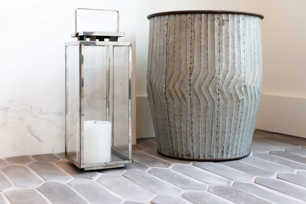 Picket floor with lantern and planter