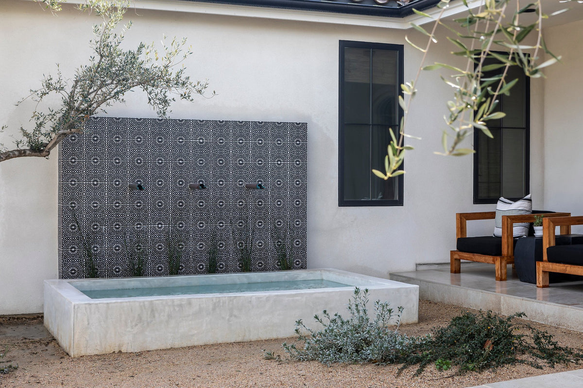 Fountain wall in the side courtyard
