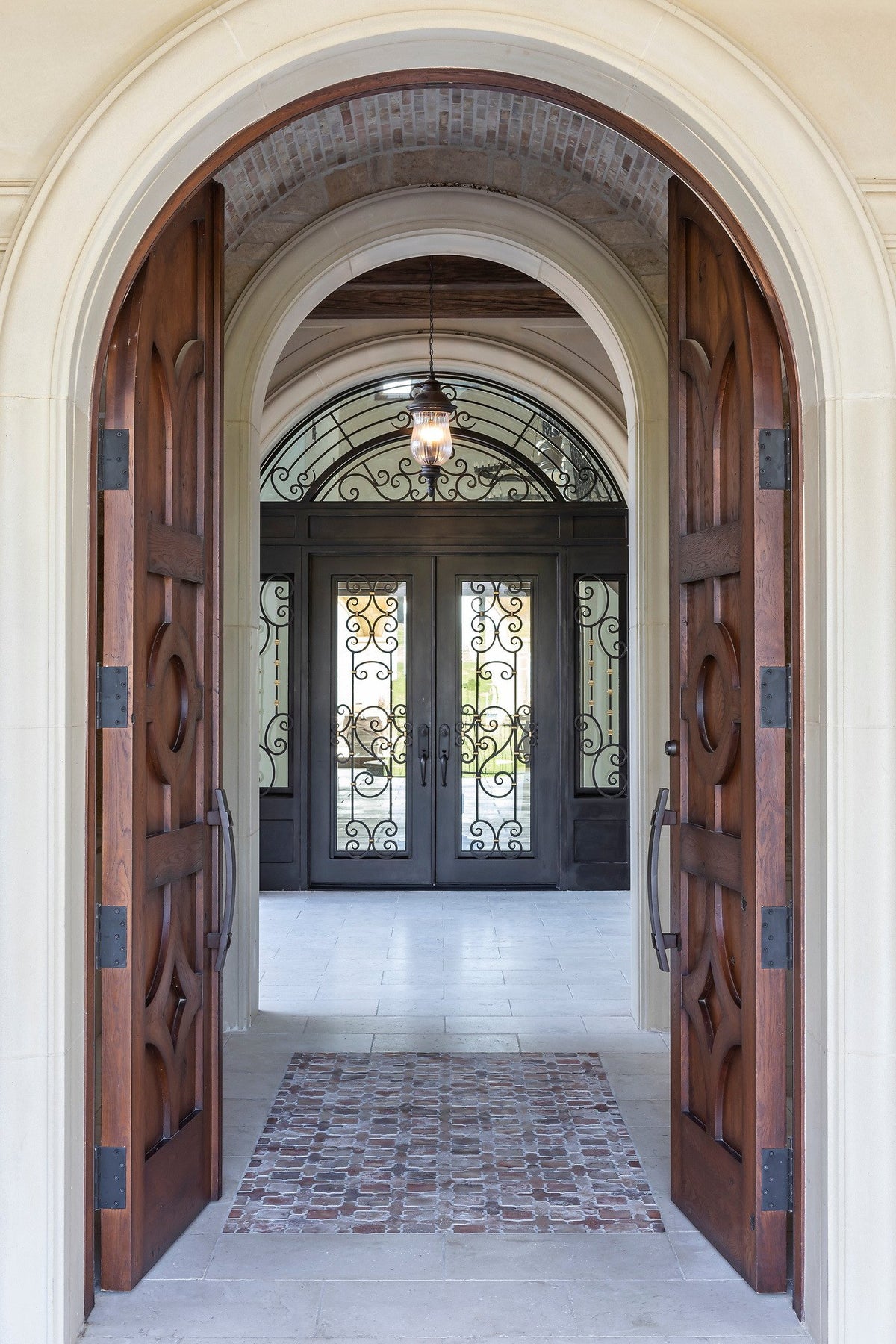 Arched entry with Artillo tile rug