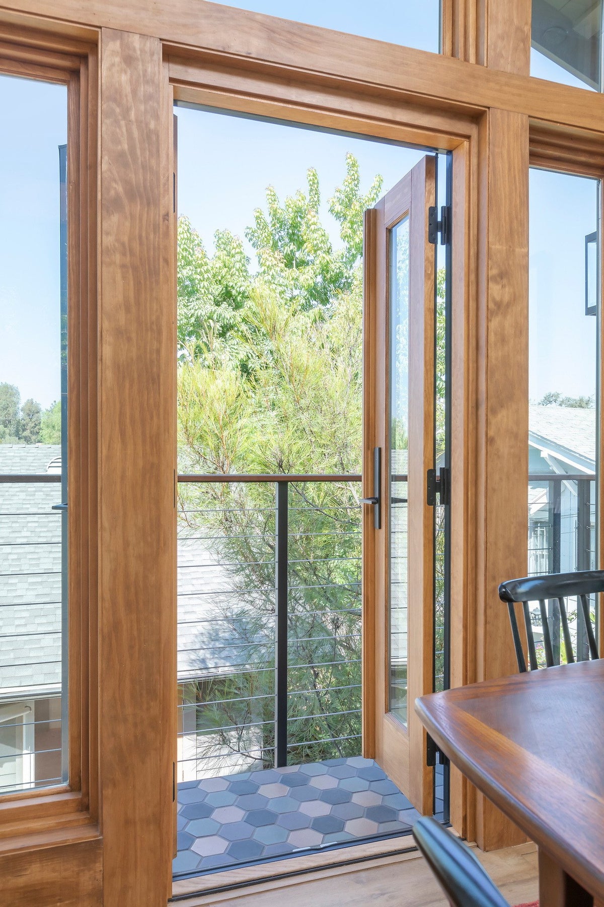 Balcony doors open to Studio Hexagon