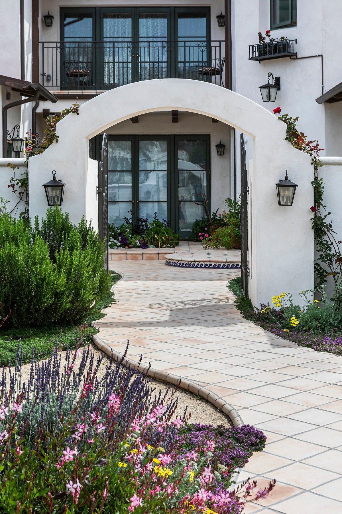 Diagonal tile path under the arch