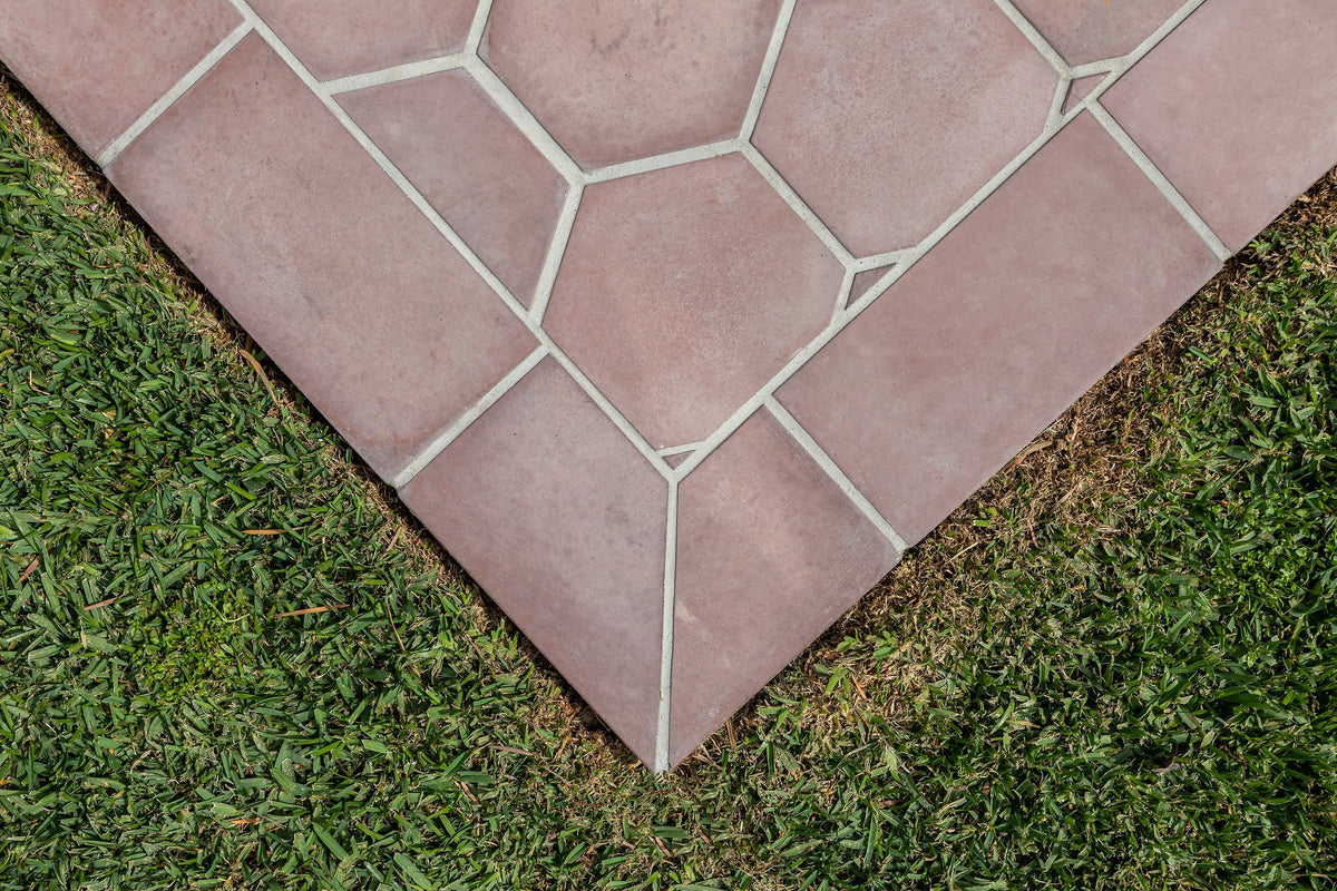 Mitered border where patio meets grass