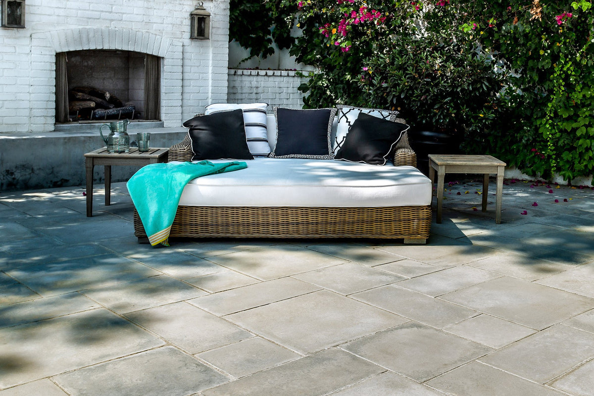 Roman paver patio by the fireplace