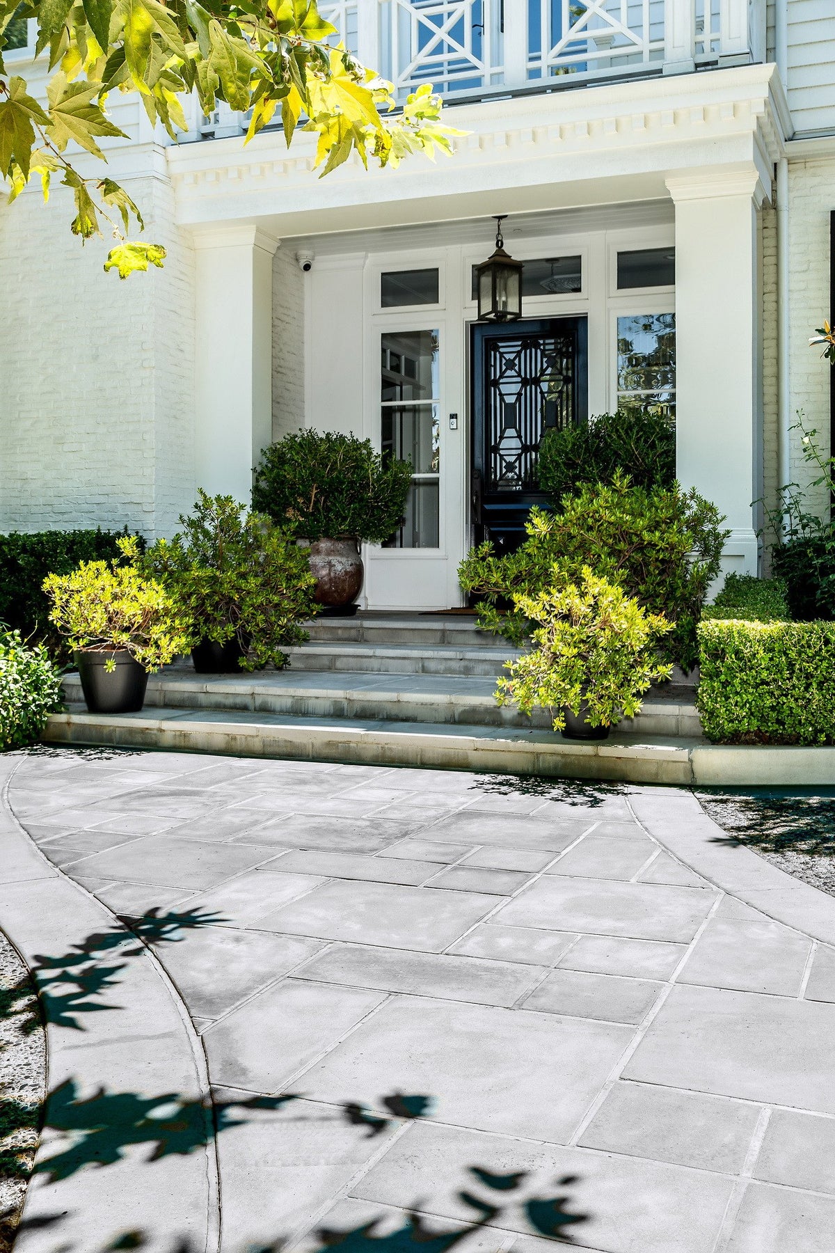 Front entry with Roman pavers