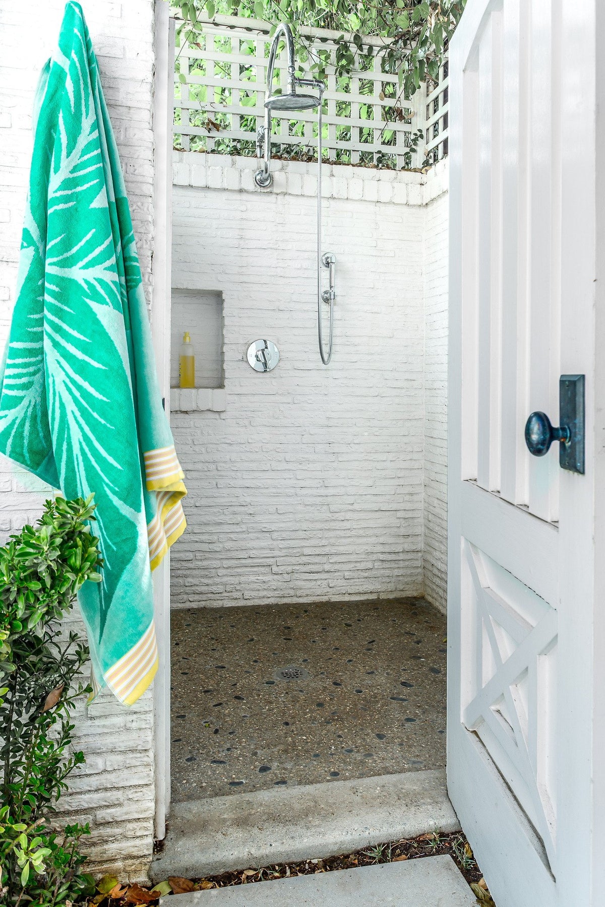 Outdoor shower in painted brick