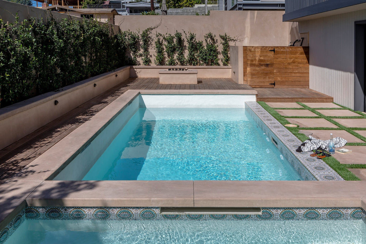 Backyard pool with handpainted deco band