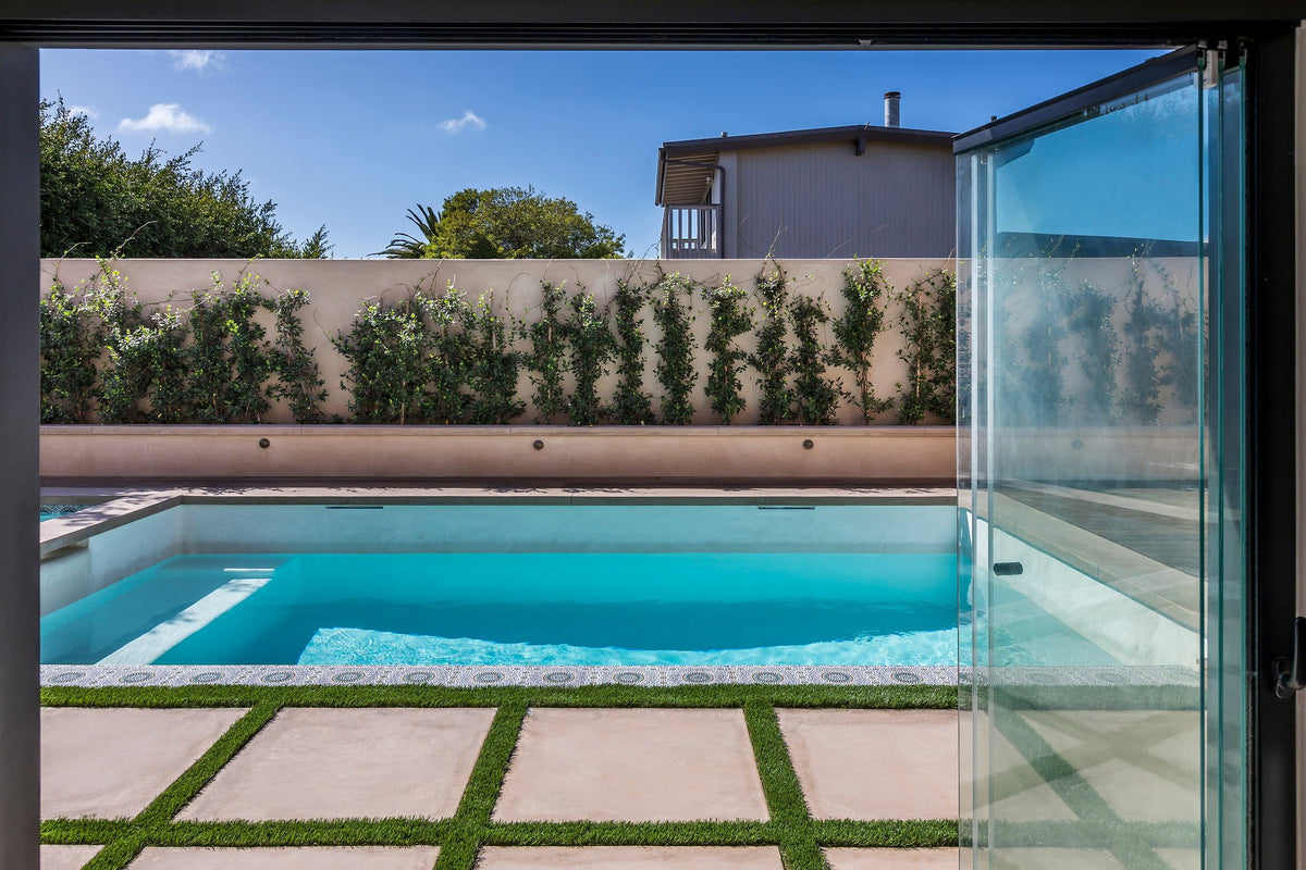 Pool and paver deck from the house