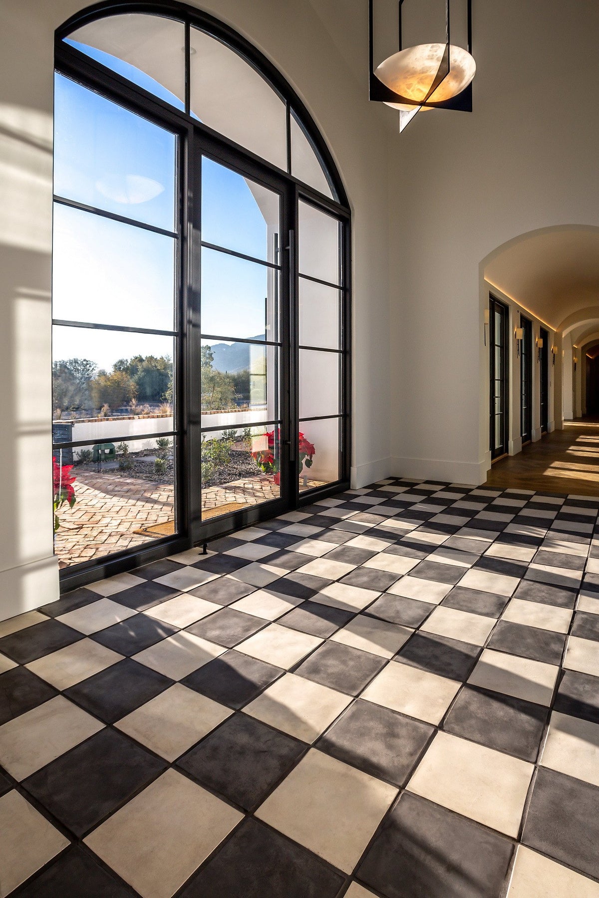 Charcoal and Rice checkerboard hallway