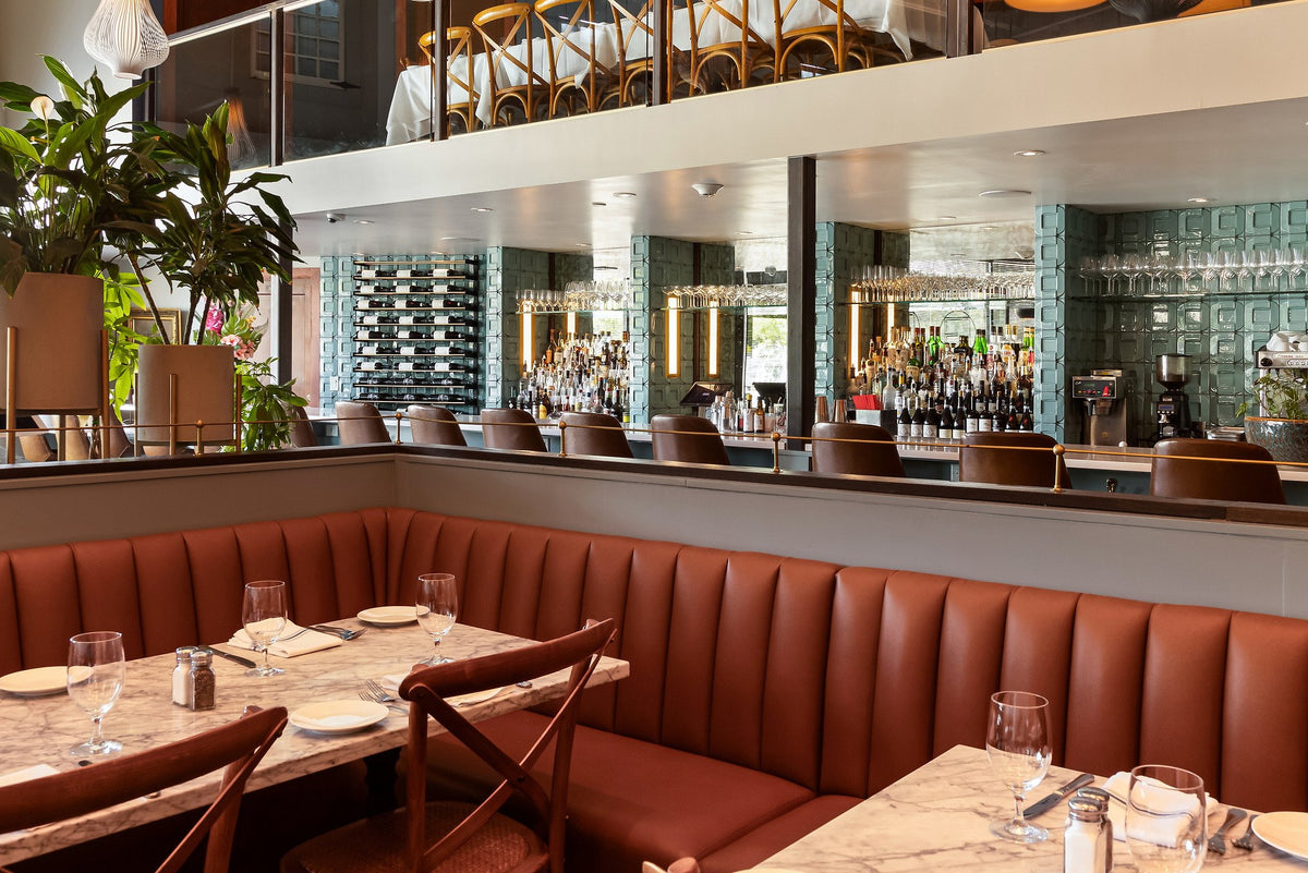 Booths below the Buckle tile walls