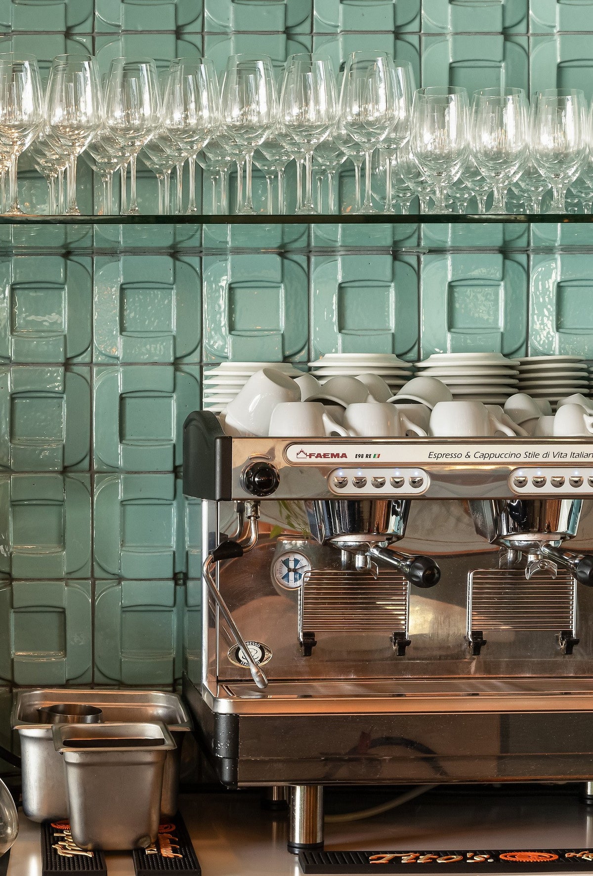 Glossy Buckle tile behind espresso