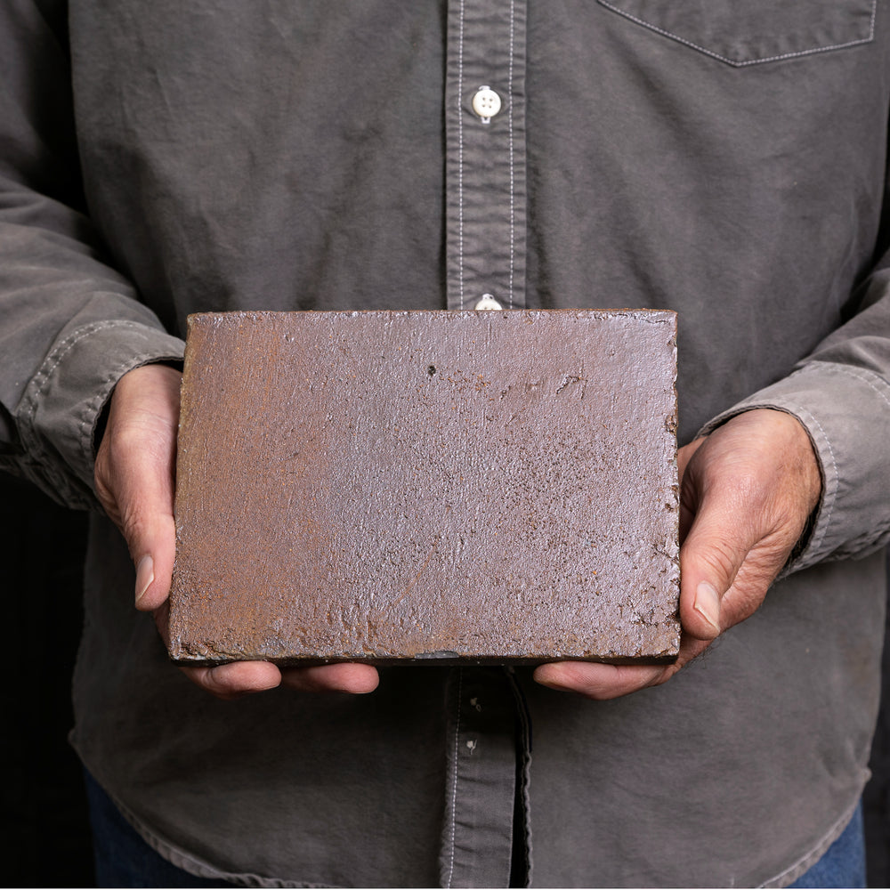 A single Kogecha tile held in two hands