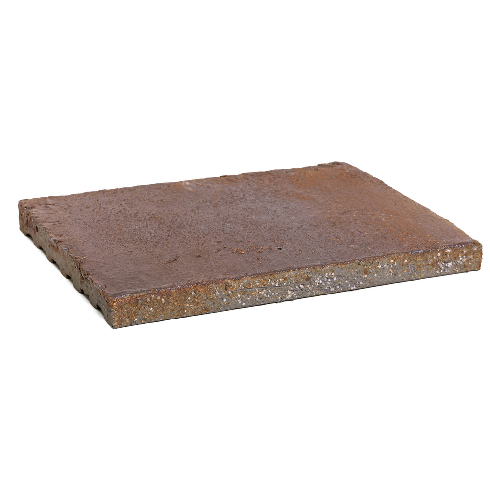 A Kogecha tile seen at an angle, showing its edge and thickness