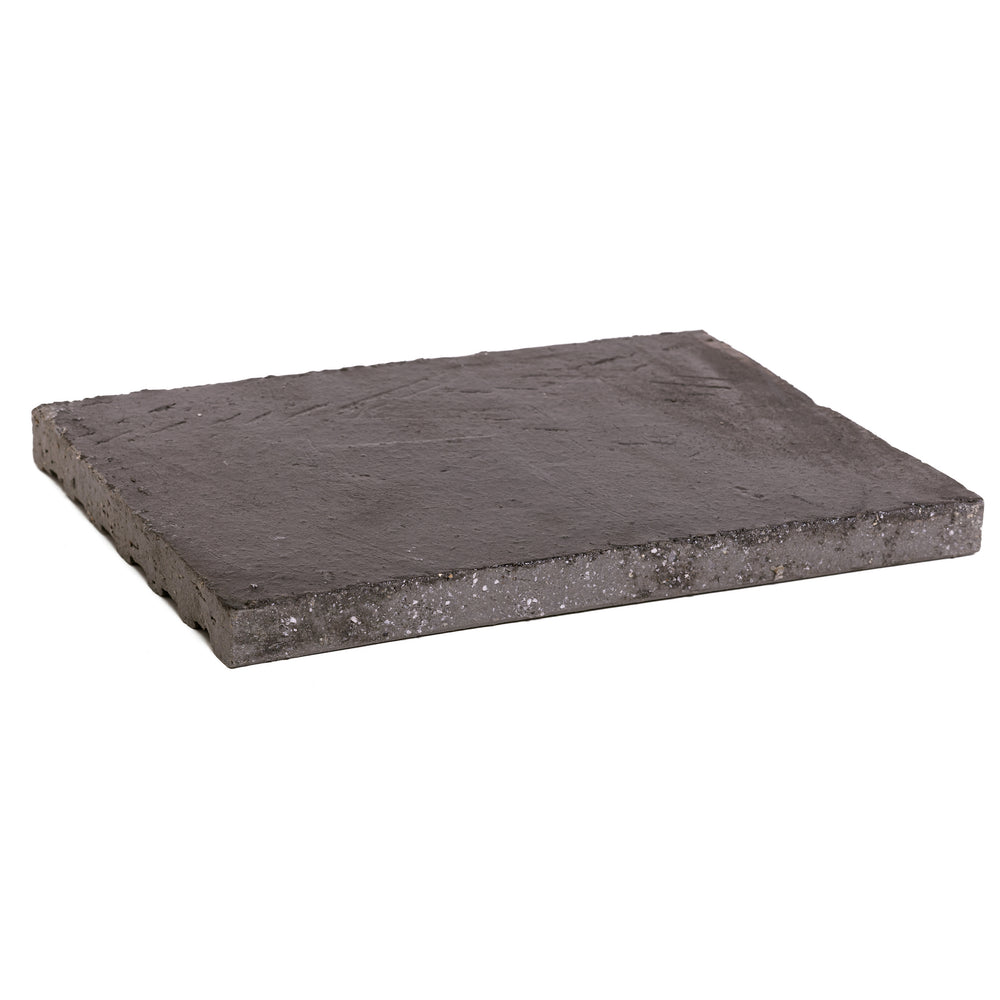 A Kuro tile seen at an angle, showing its edge and thickness