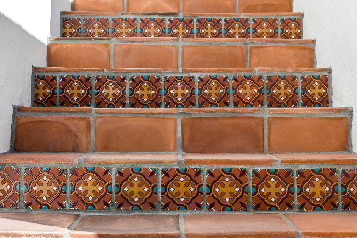 Outdoor steps with decorative risers
