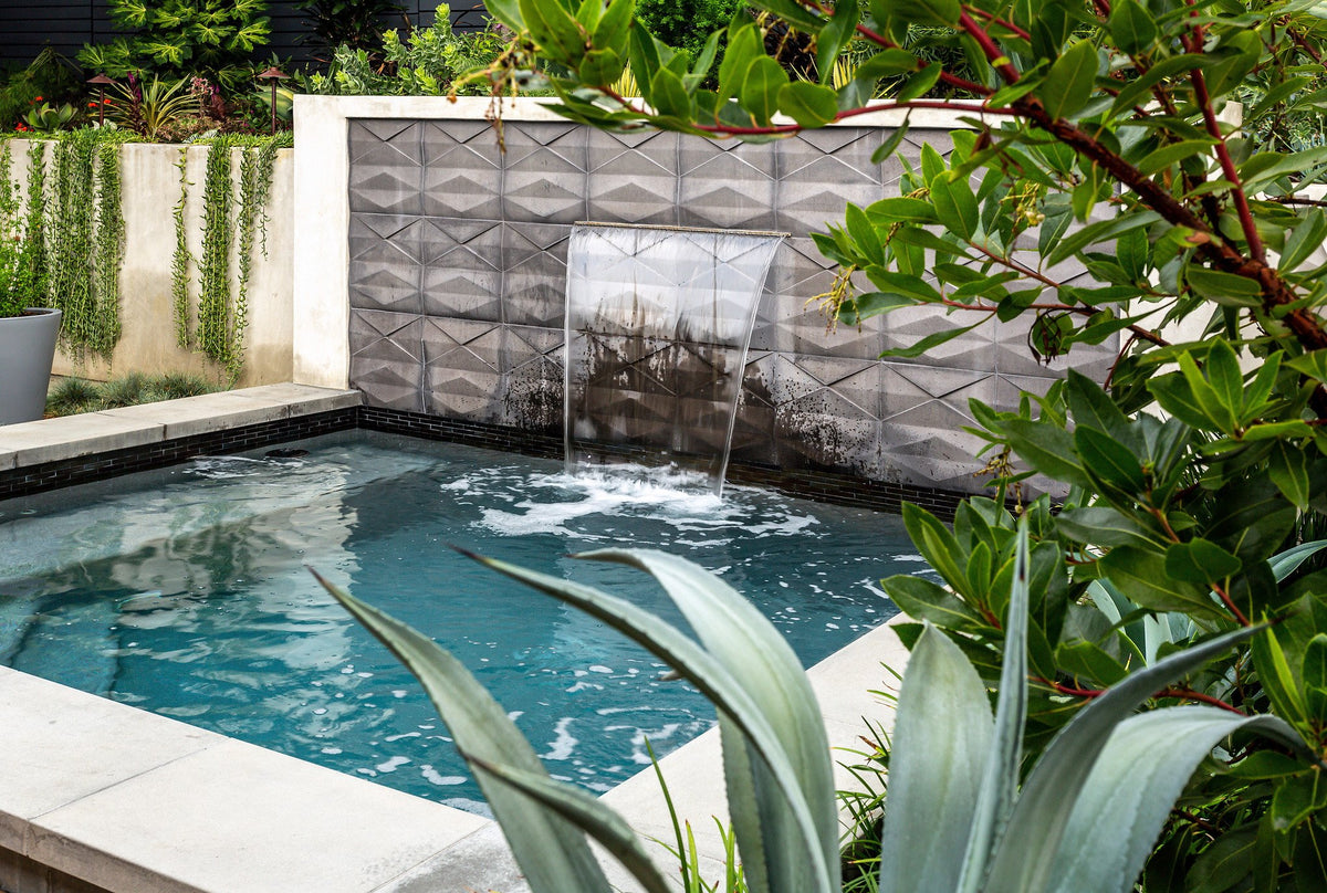 Feature wall seen through the garden