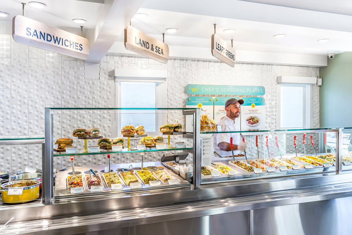 Food counter backed by dimensional tile