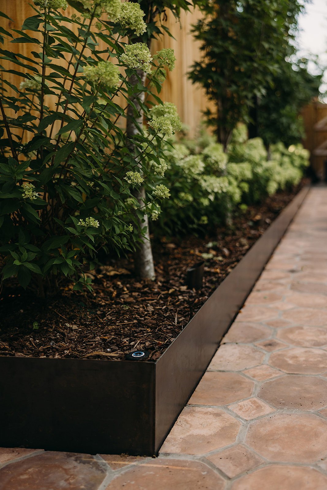 Octagon walkway along a planter