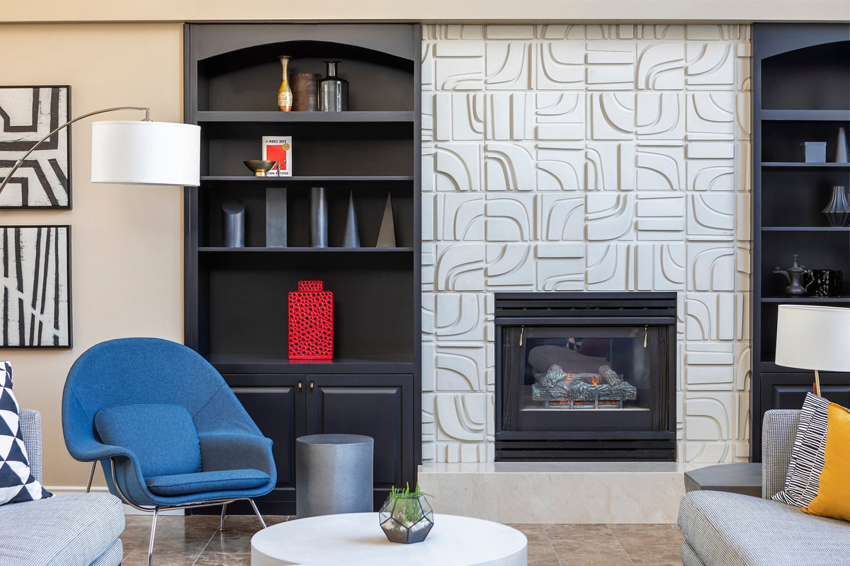 Fireplace between black built-ins
