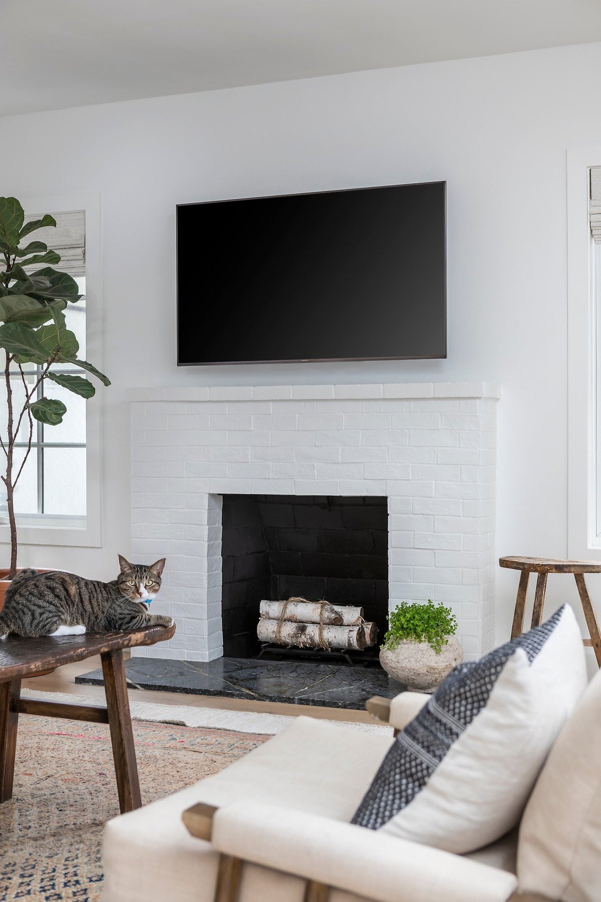 Fireplace with dark stone hearth