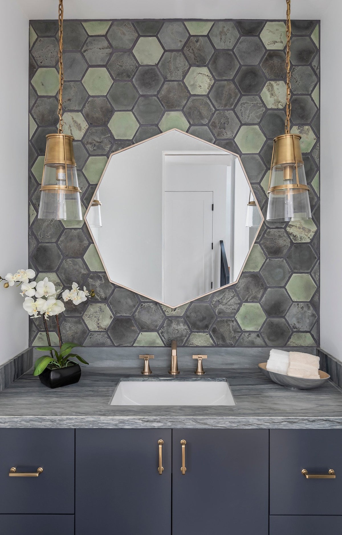 Powder room with Los Verdes hexagon wall