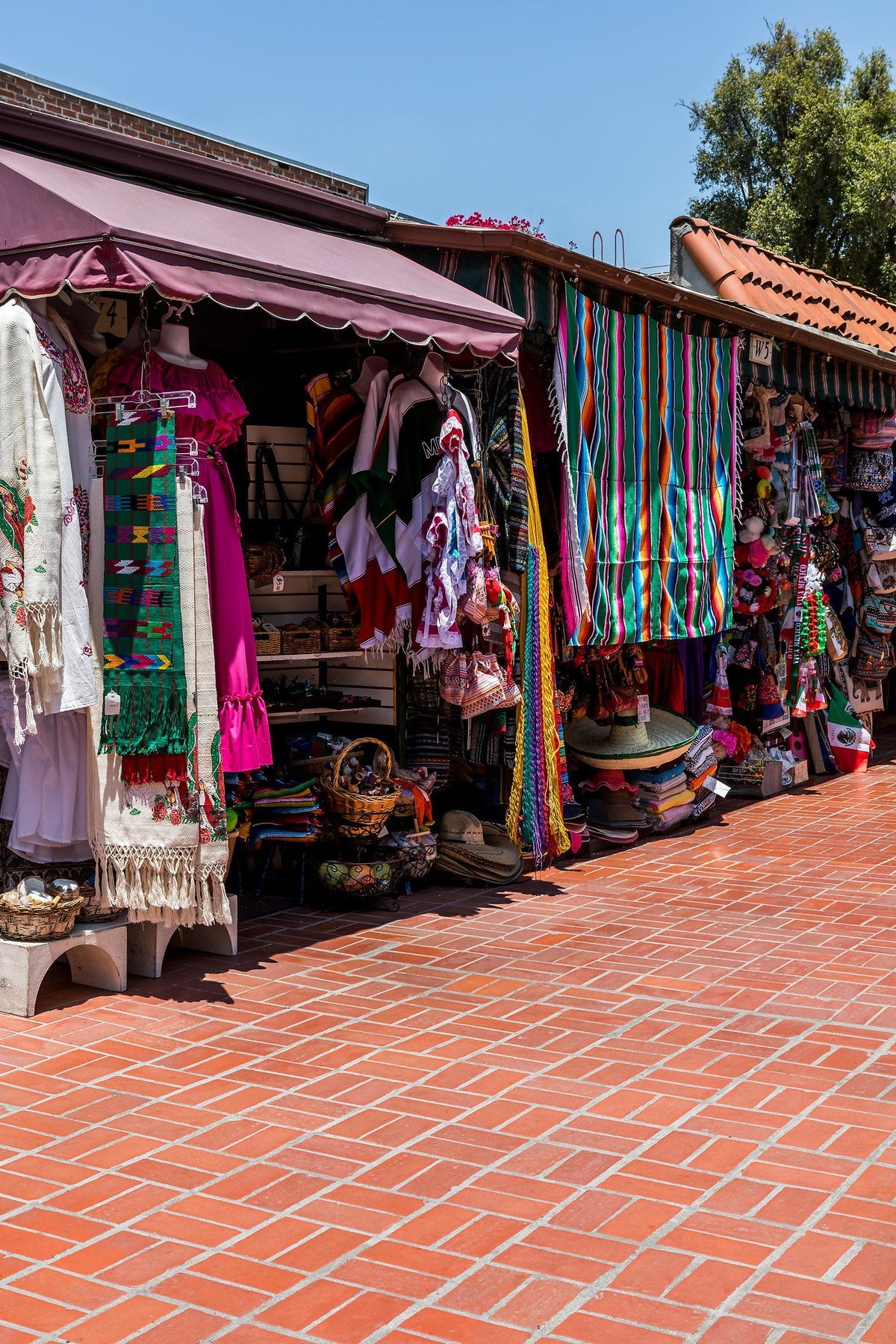 Herringbone brick beside vendor booths