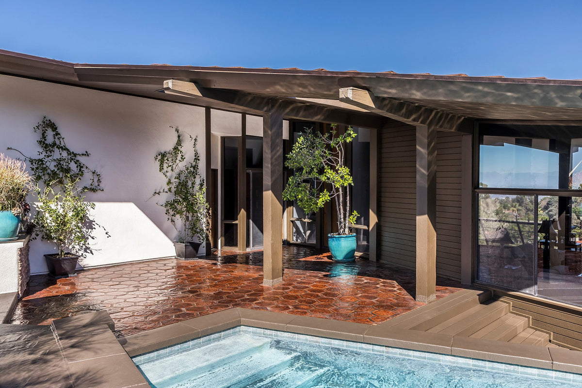 Hexagon tile patio beside the spa