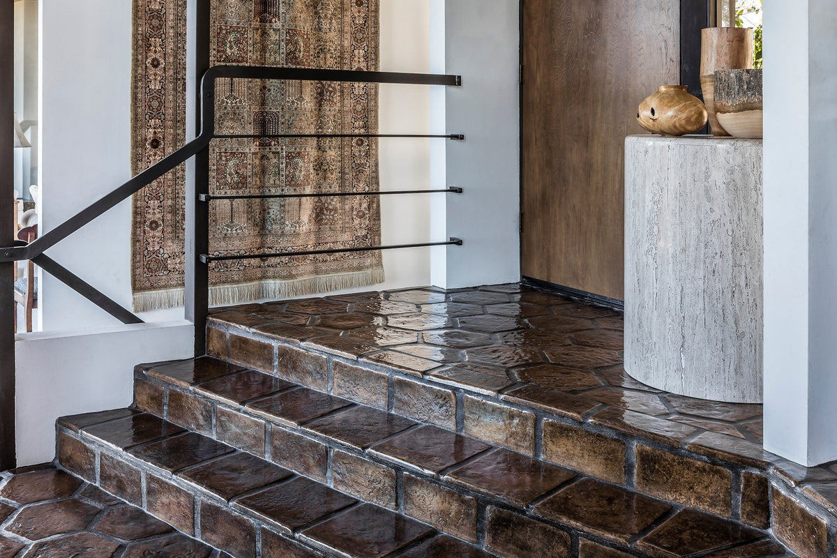 Tiled steps up from the entry