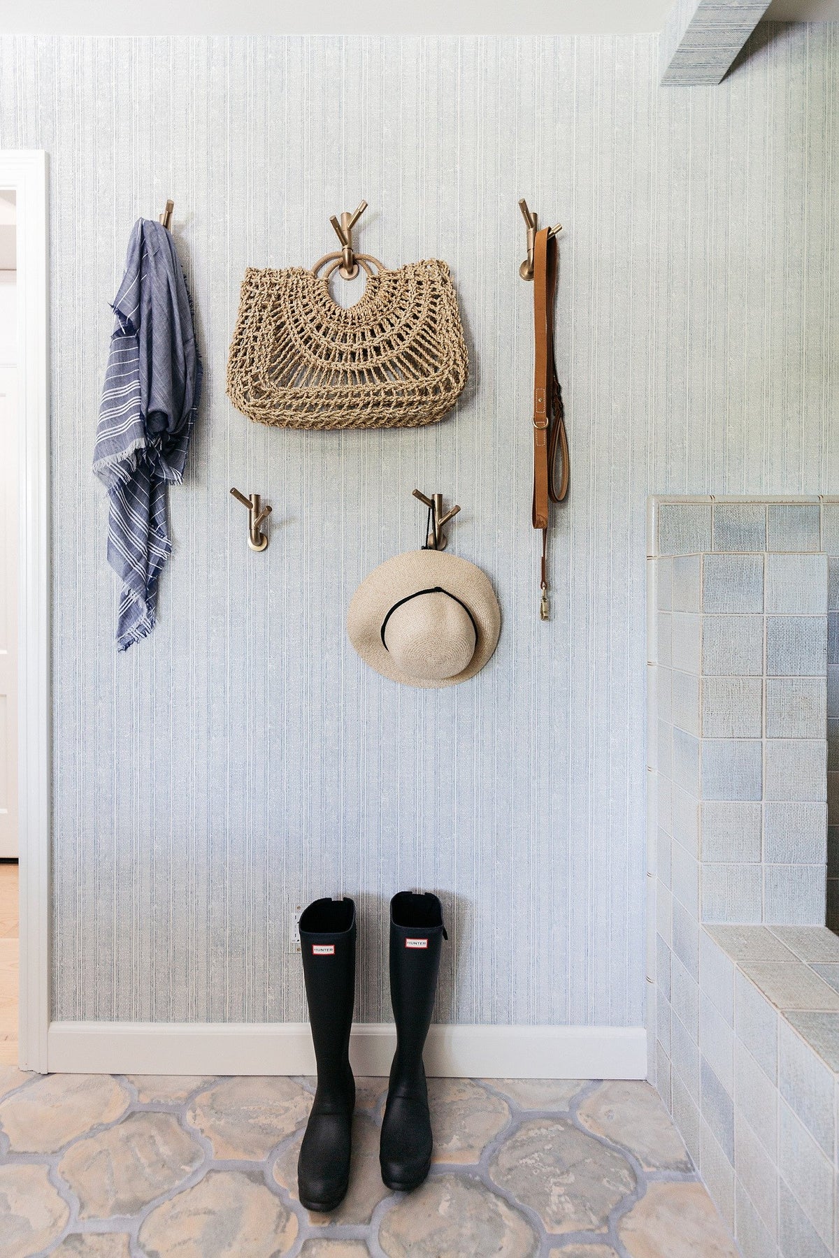 Patterned floor below the coat hooks