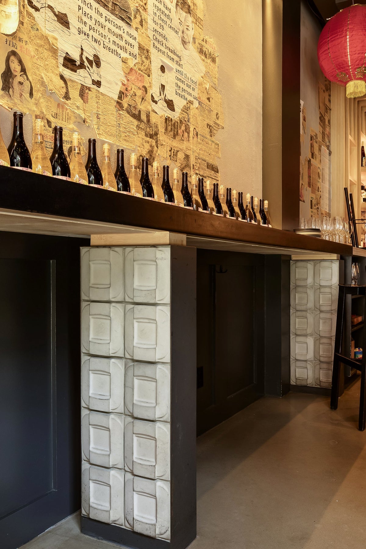 Tile on the support beneath the bar