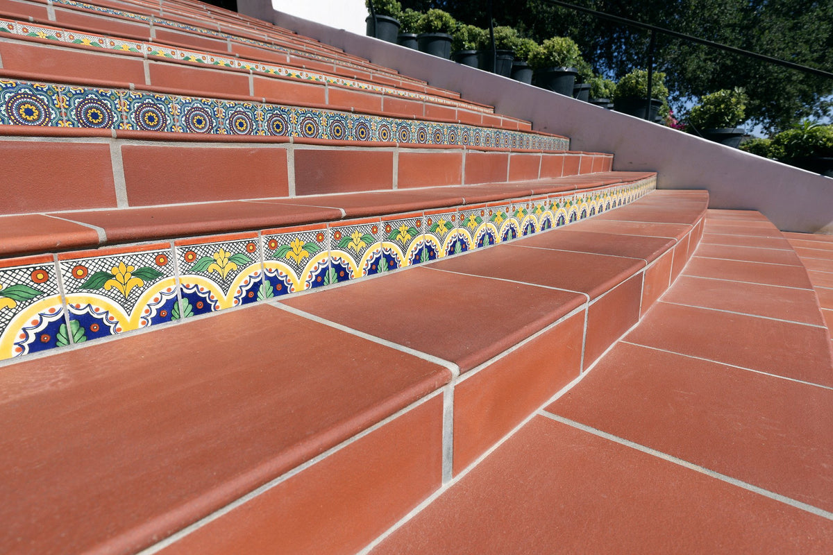 Tread edges along the wide stair