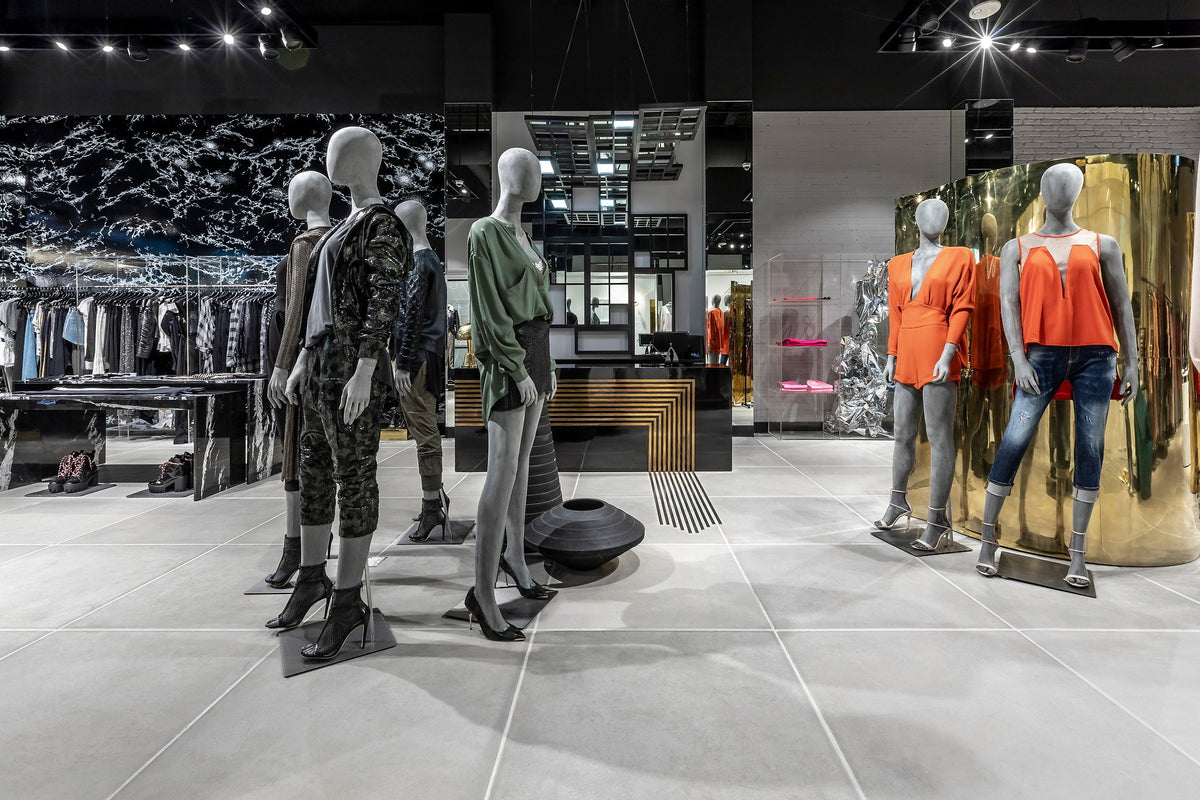 Mannequin groups on the gray floor