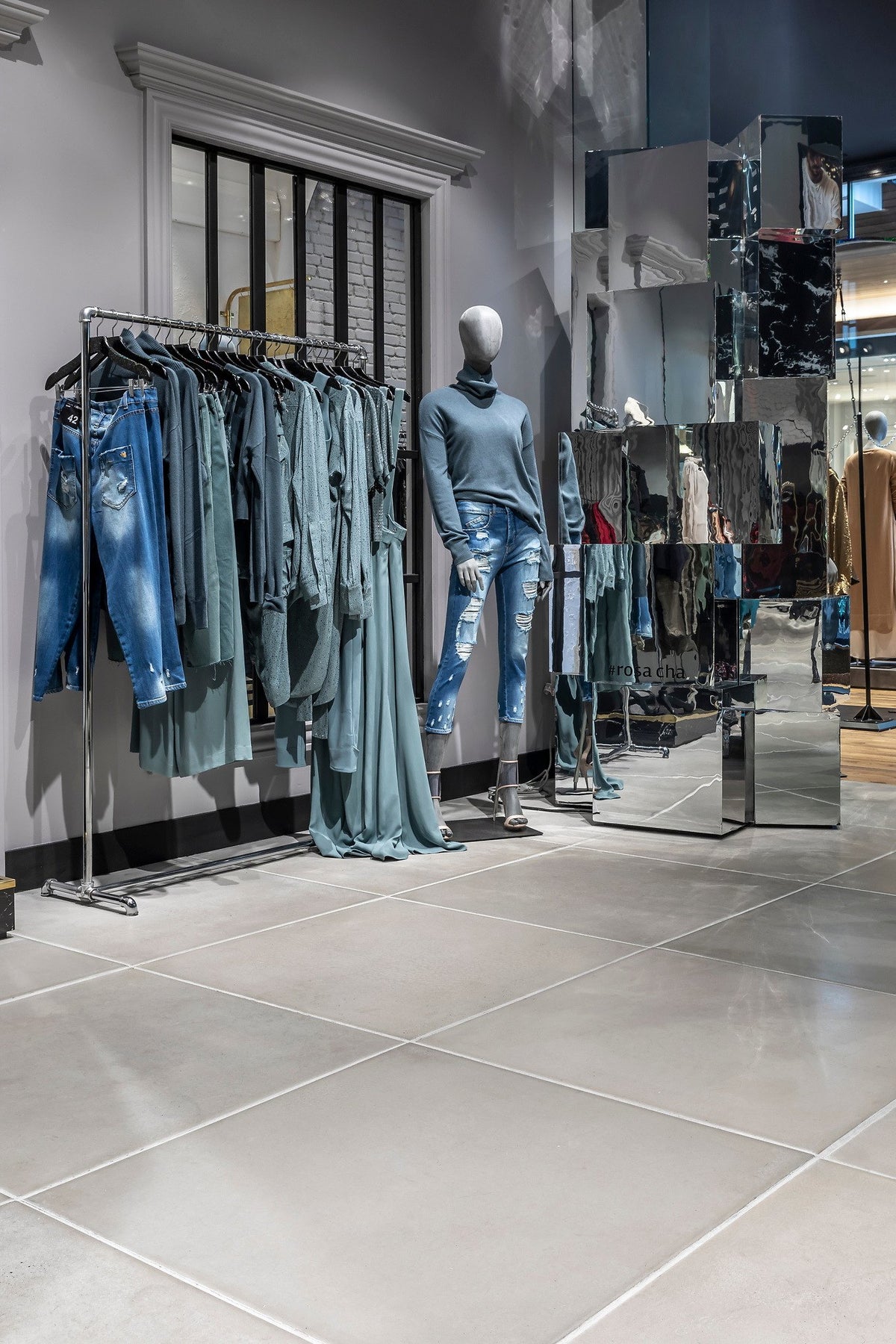Denim racks by the fitting area