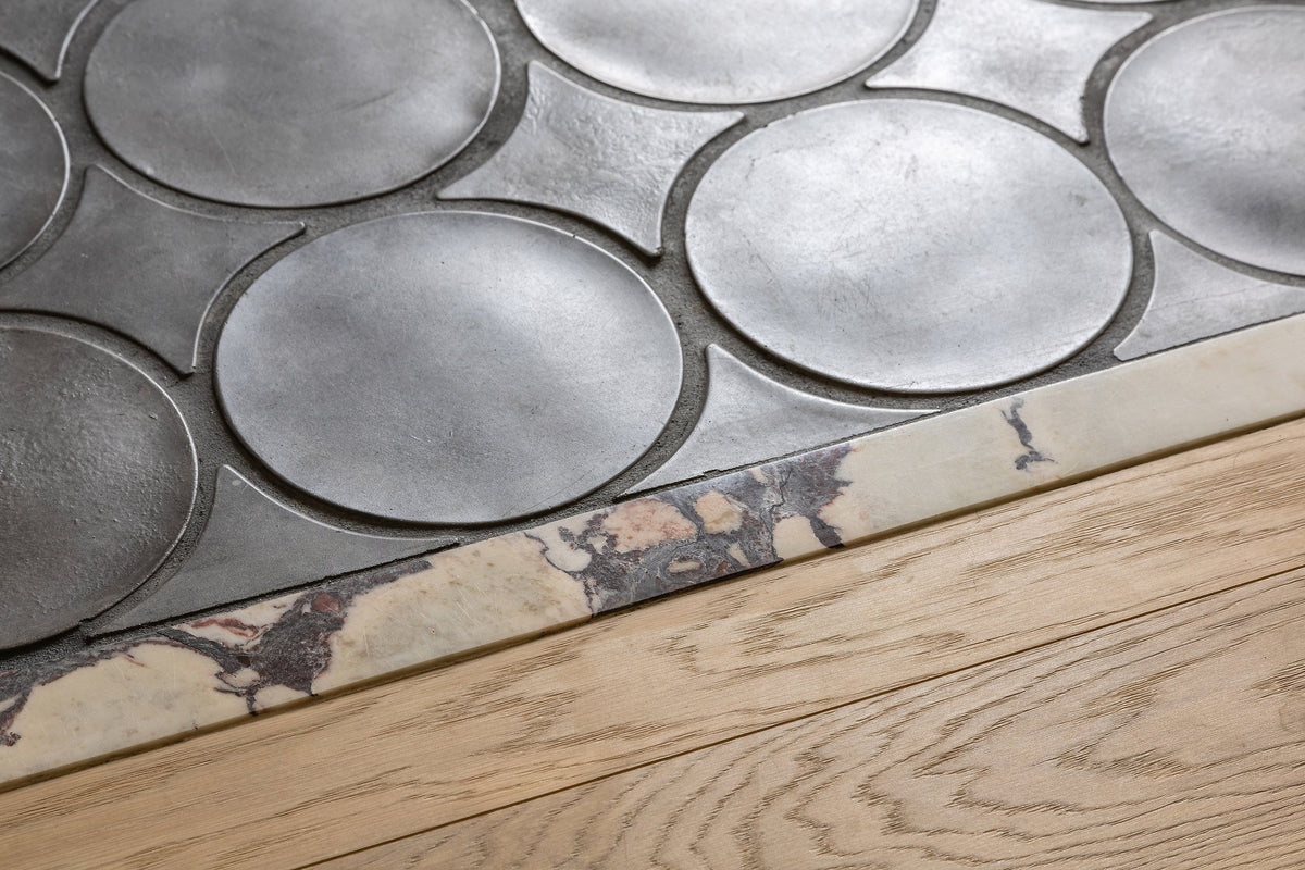 Tile edge at the vanity base