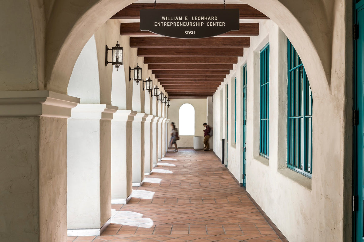 Arches framing the tiled corridor