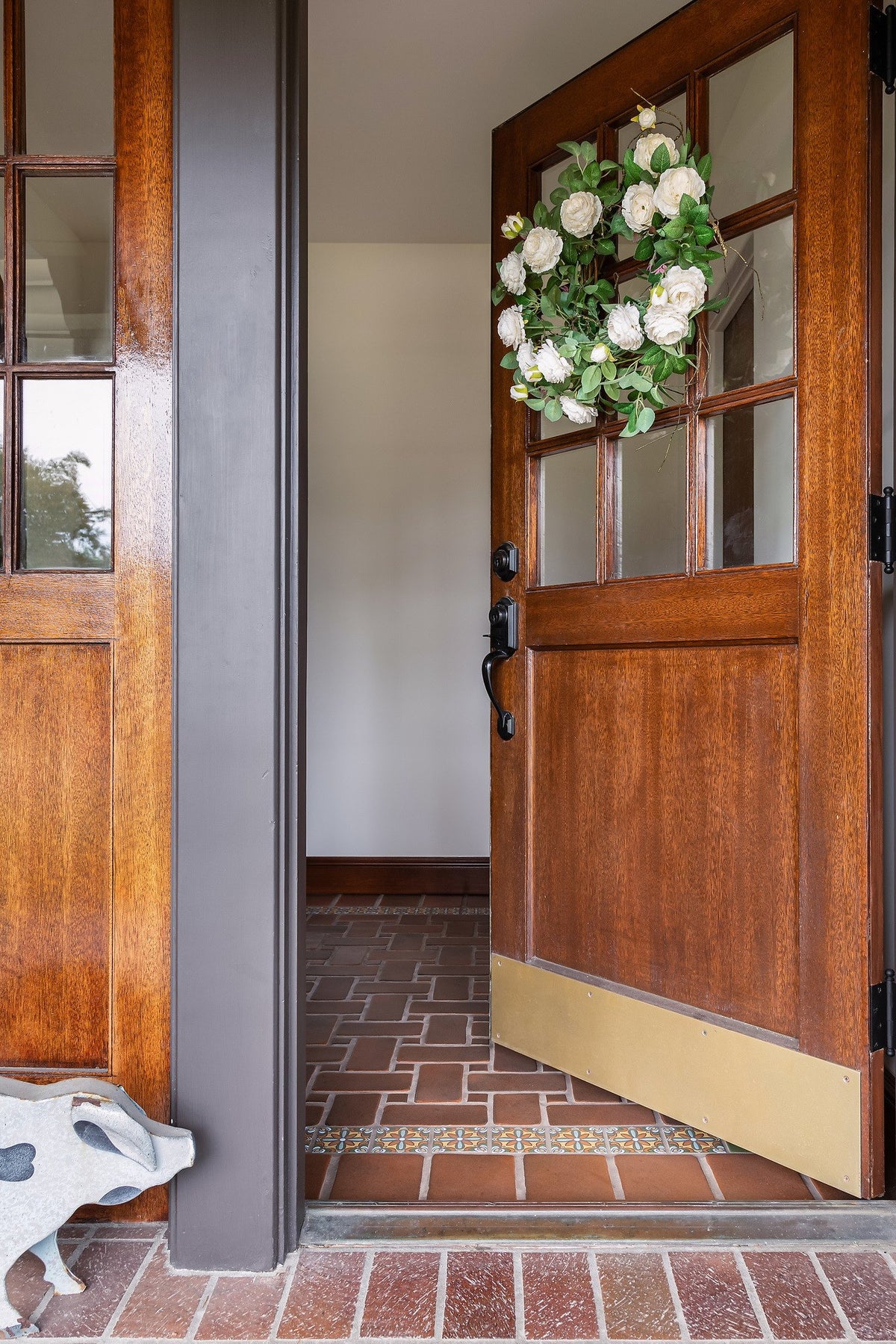 Front door opening onto the tile