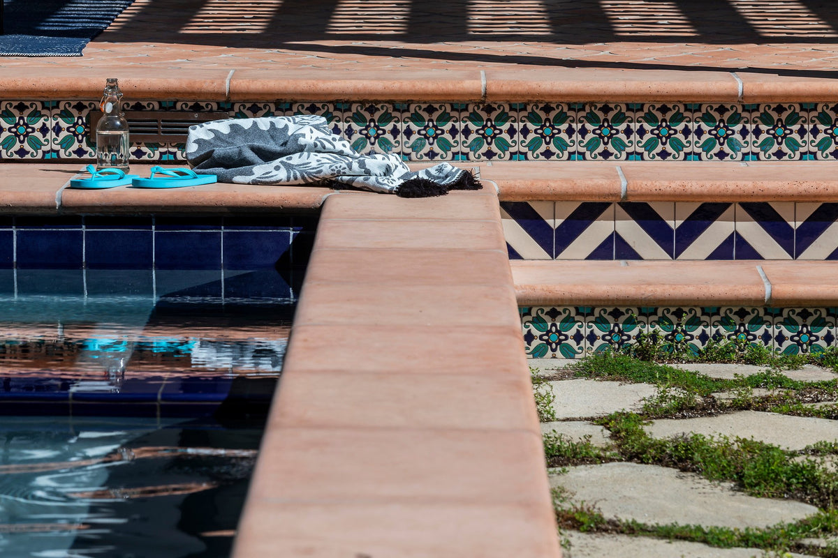 Coping over the deco-lined spa wall