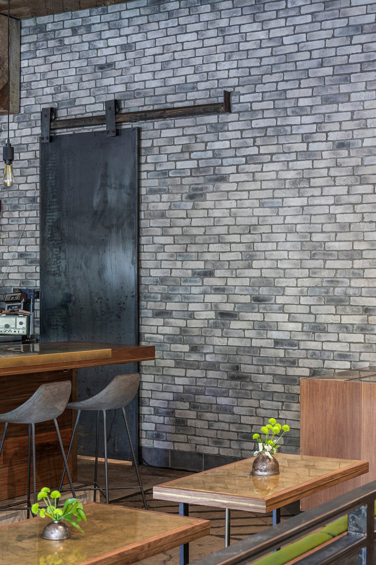 Sliding steel door on brick