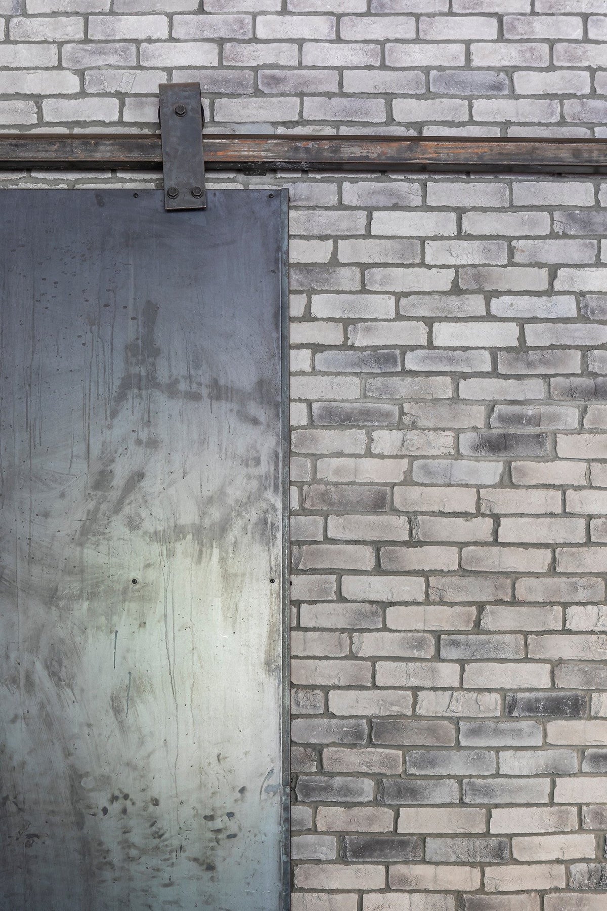 Steel door against Antik brick