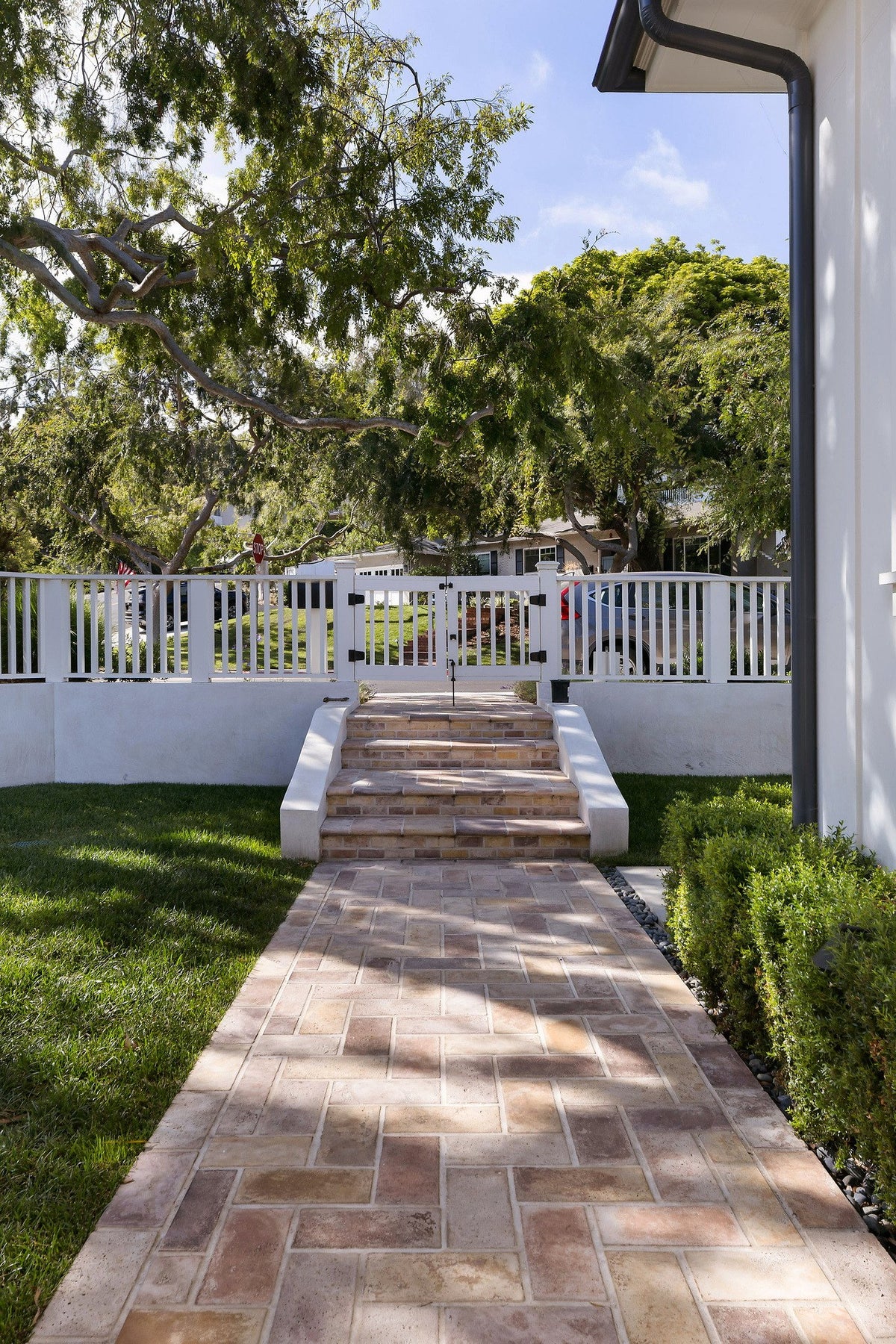 Paver walkway leading to garden steps