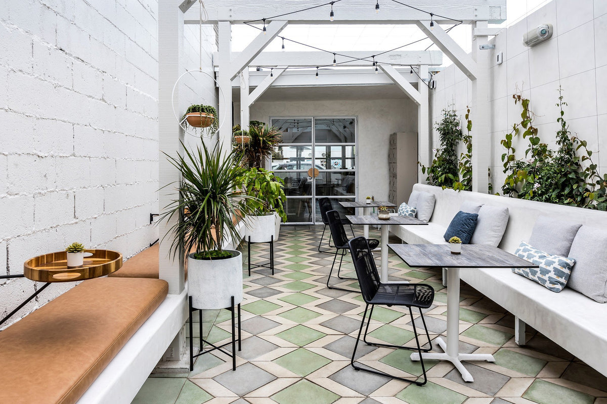 Banquette seating over patterned floor