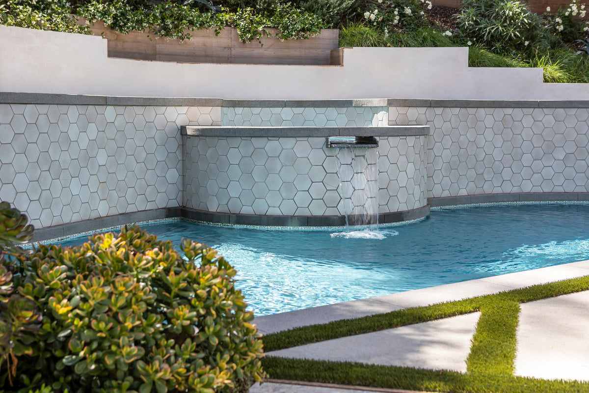 Raised spa and retaining wall
