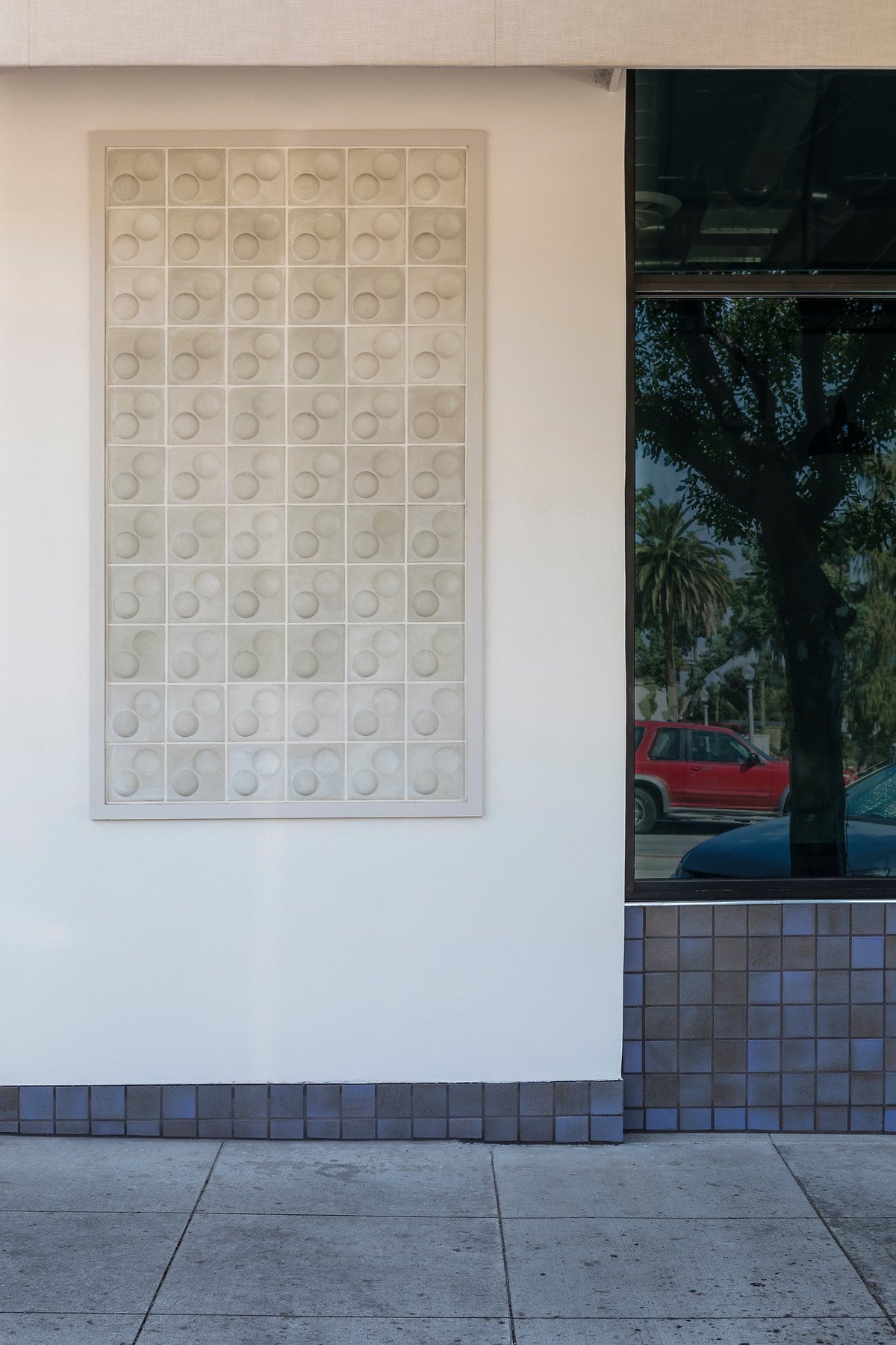 3D panel above Studio wainscot
