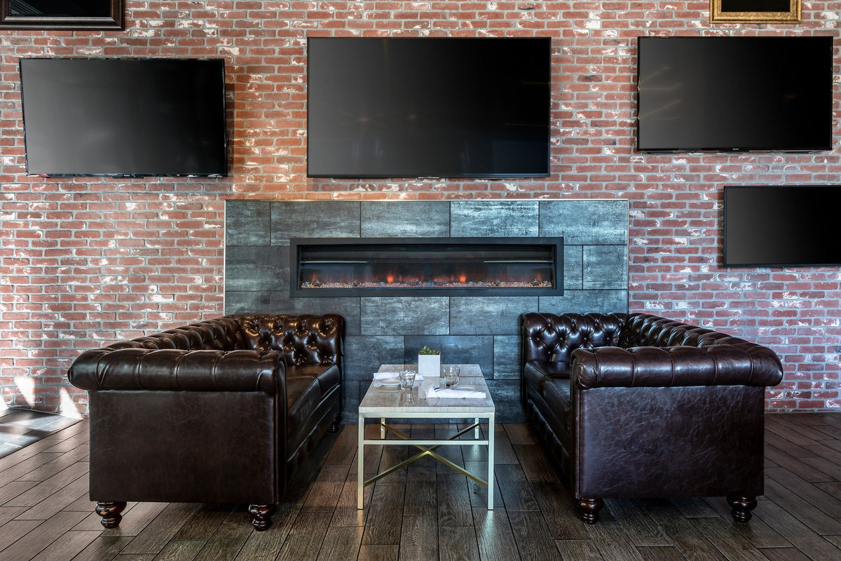 Fireplace lounge with brick wall